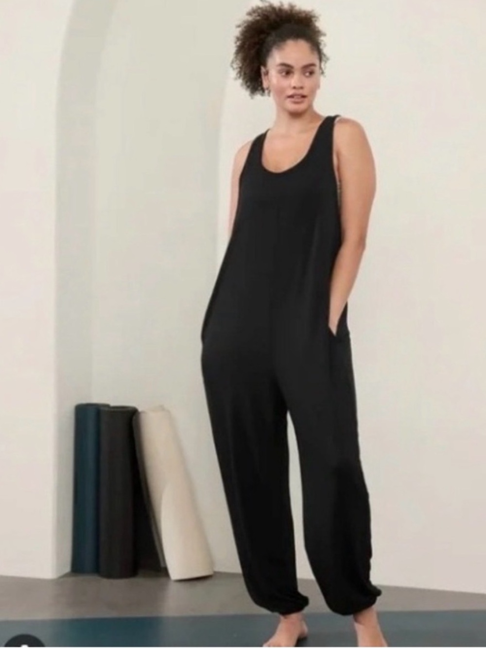 Athleta sleeveless black jersey jumpsuit with pockets